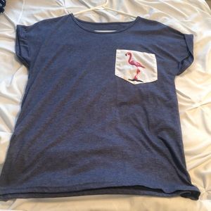 blue t shirt with flamingo pocket